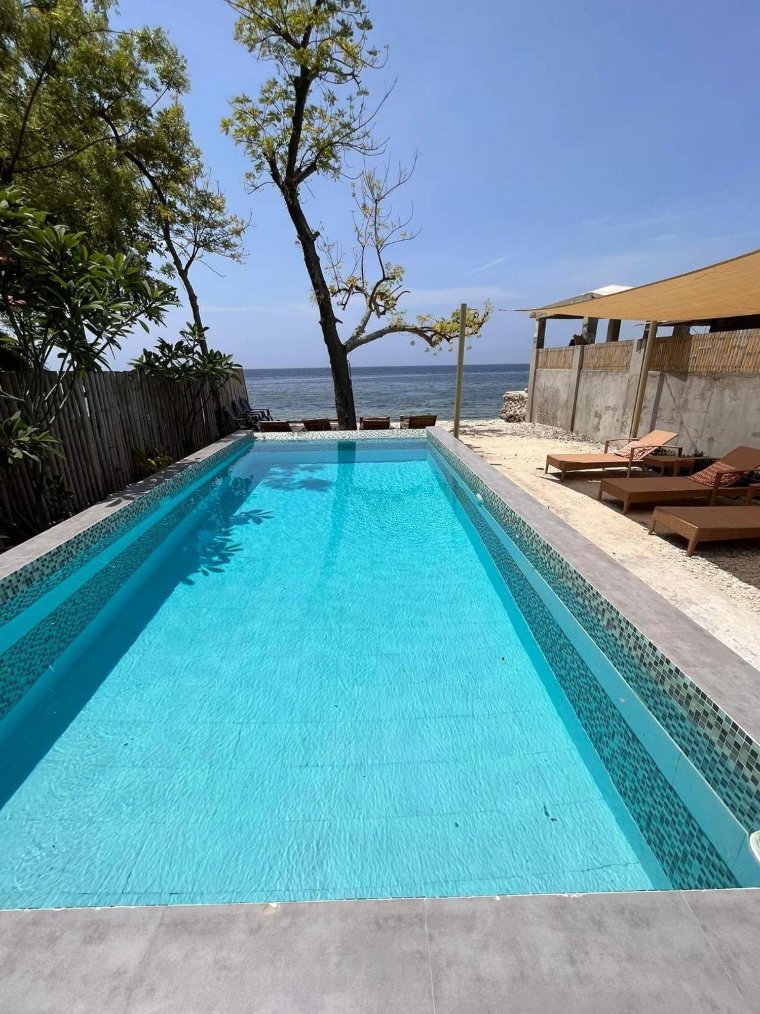 Southseas Beach Resort And Dive Center Santander Exterior foto